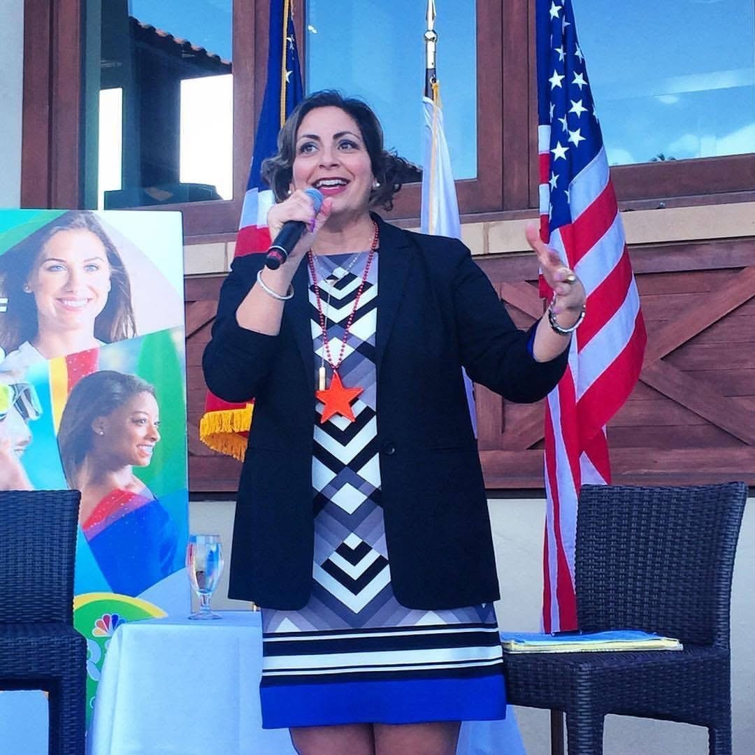 Kim Bardakian hosting an NBC Olympics event