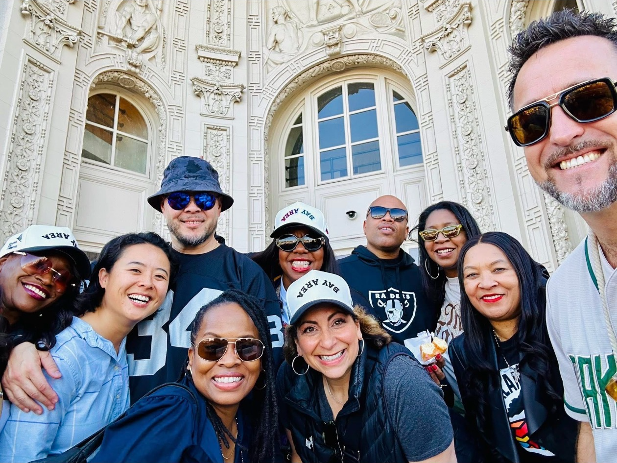 Kim Bardakian with a group of Bay Area community leaders outside Oakland City Hall